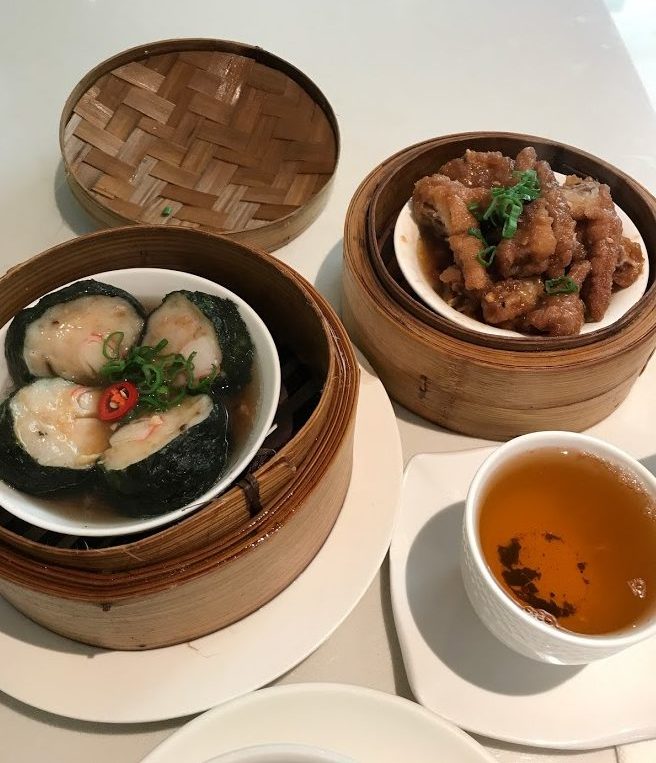 dim-sum Two bowls full of dim sum and a cup of black tea